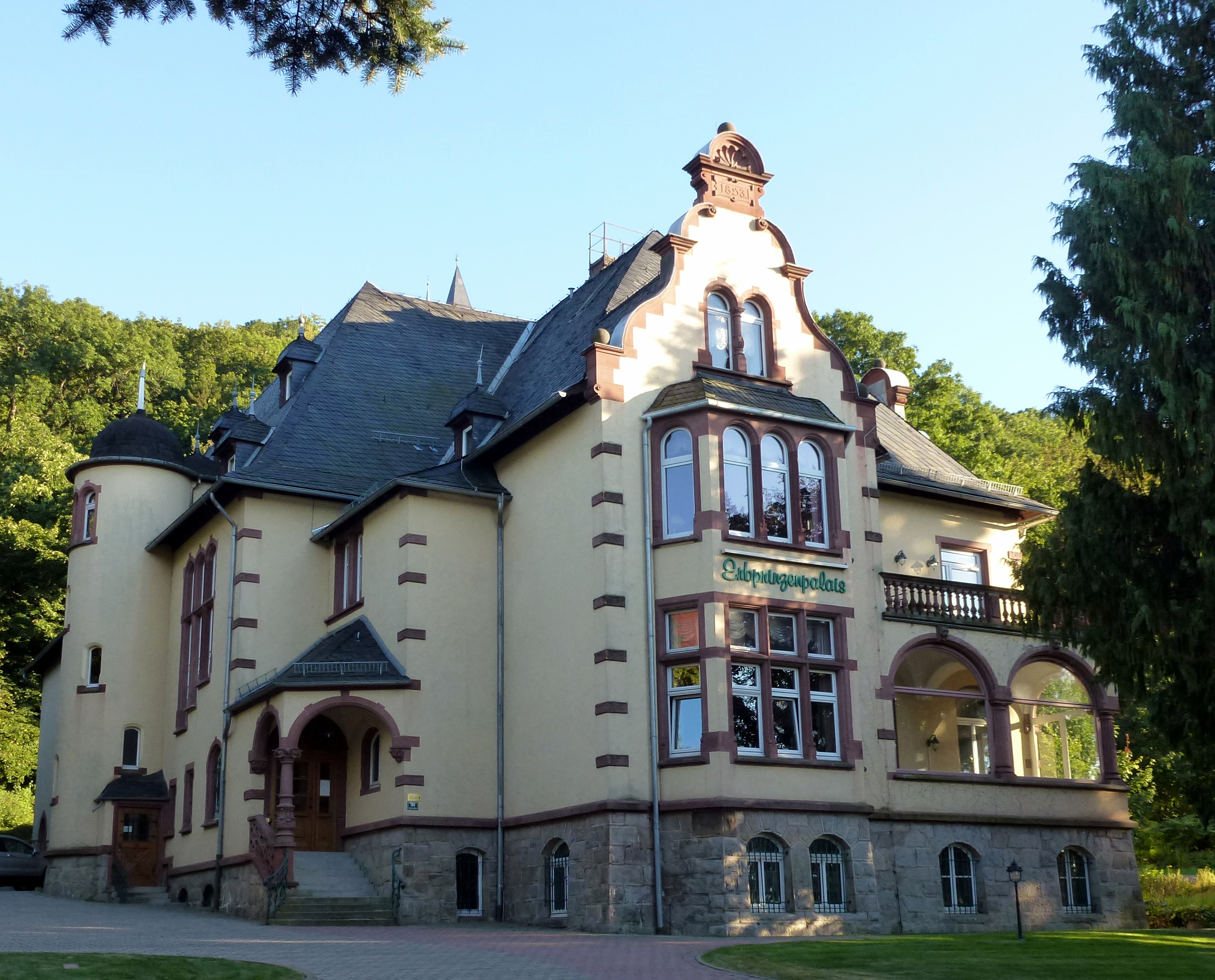 The historic Erbprinzenpalais villa beneath the wooded slopes of Wernigerode Castle